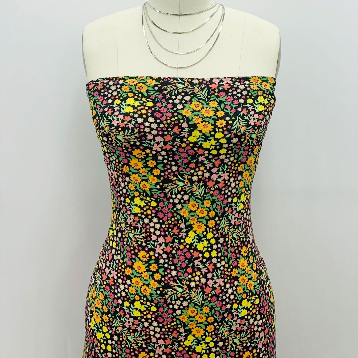 P-1913-703-BLACK-MARIGOLD - PRINTED TWIST CREPE 92% POLY 8% SPANDEX