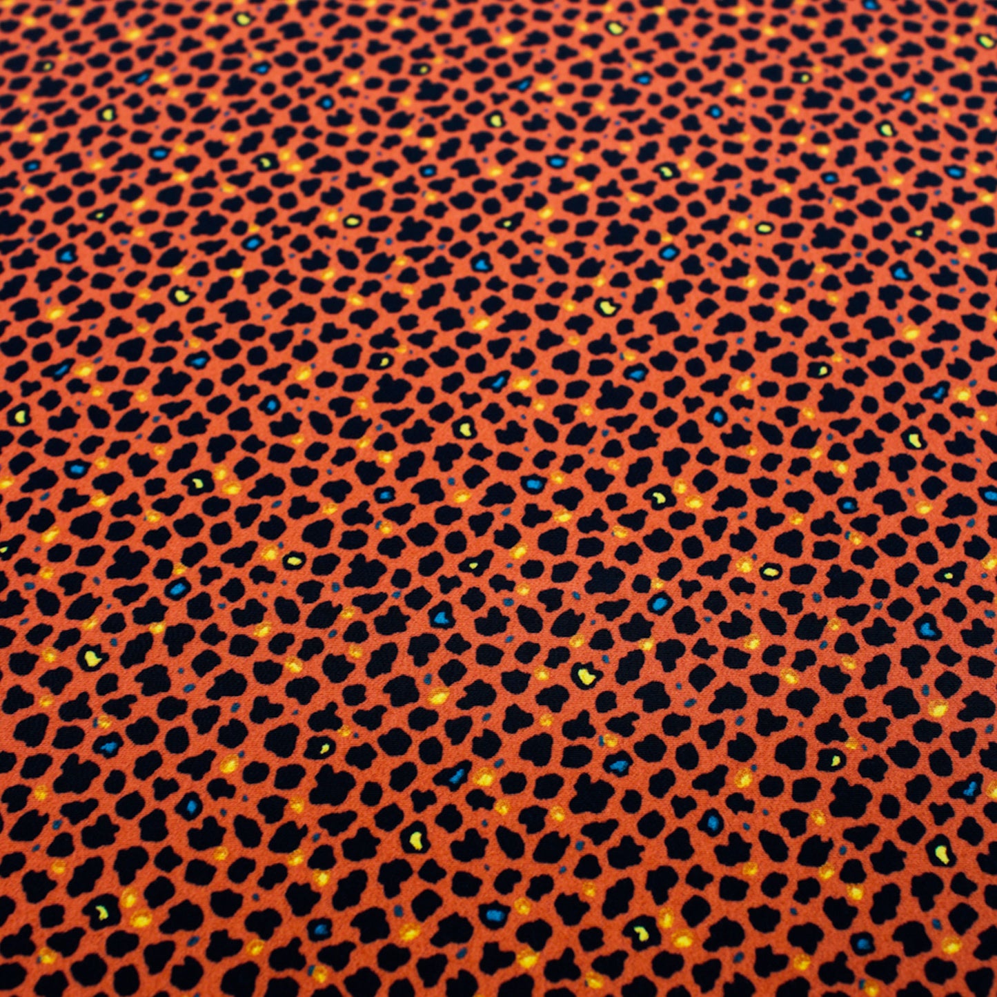 P-1337-754-BURNT-ORANGE-BLACK - PRINTED POLY MOROCCAN 100% POLY